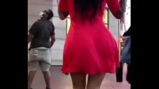 women ass jigging walking in the street
