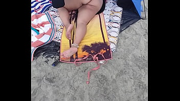 watching exhibitionistic wife at beach